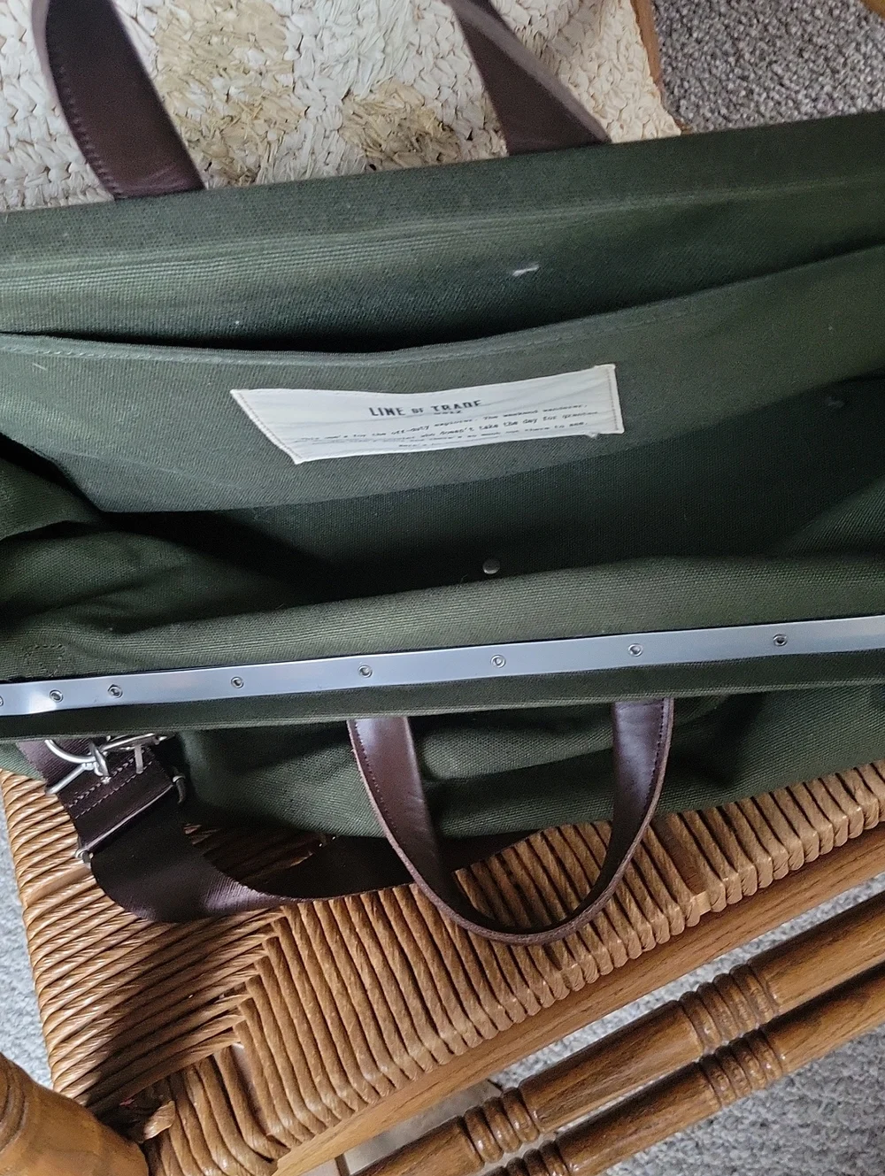 Line of Trade green military duffle sack with brown canvas strap